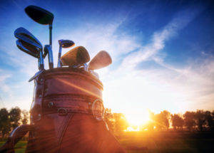 image of a golf back with a setting sun in the background