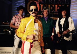 Image of lead singer and band dressed like Queen